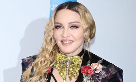 Madonna Seductively Sucks on Pink Candy Backstage Amid ‘Celebration’ Tour: Photos
