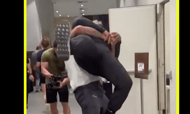 Watch: Alex Pereira takes Daniel Cormier down in backstage grappling match