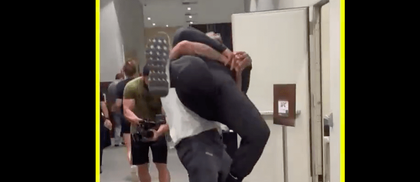 Watch: Alex Pereira takes Daniel Cormier down in backstage grappling match