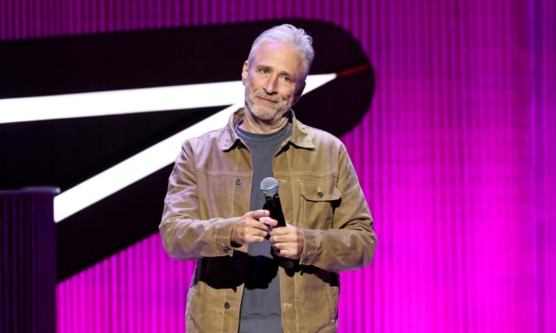 Jon Stewart wore an Eagles jersey to a Knicks game after losing a bet with Jalen Brunson