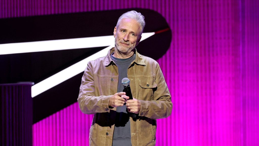 Jon Stewart wore an Eagles jersey to a Knicks game after losing a bet with Jalen Brunson