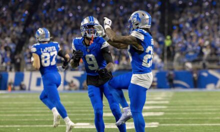 Jameson Williams lets Jordan Addison know Detroit Lions receivers are best