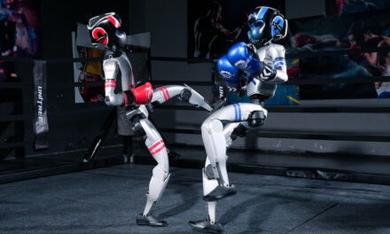 In world’s first humanoid boxing match, gloating robot face plants
