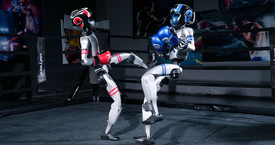 In world’s first humanoid boxing match, gloating robot face plants