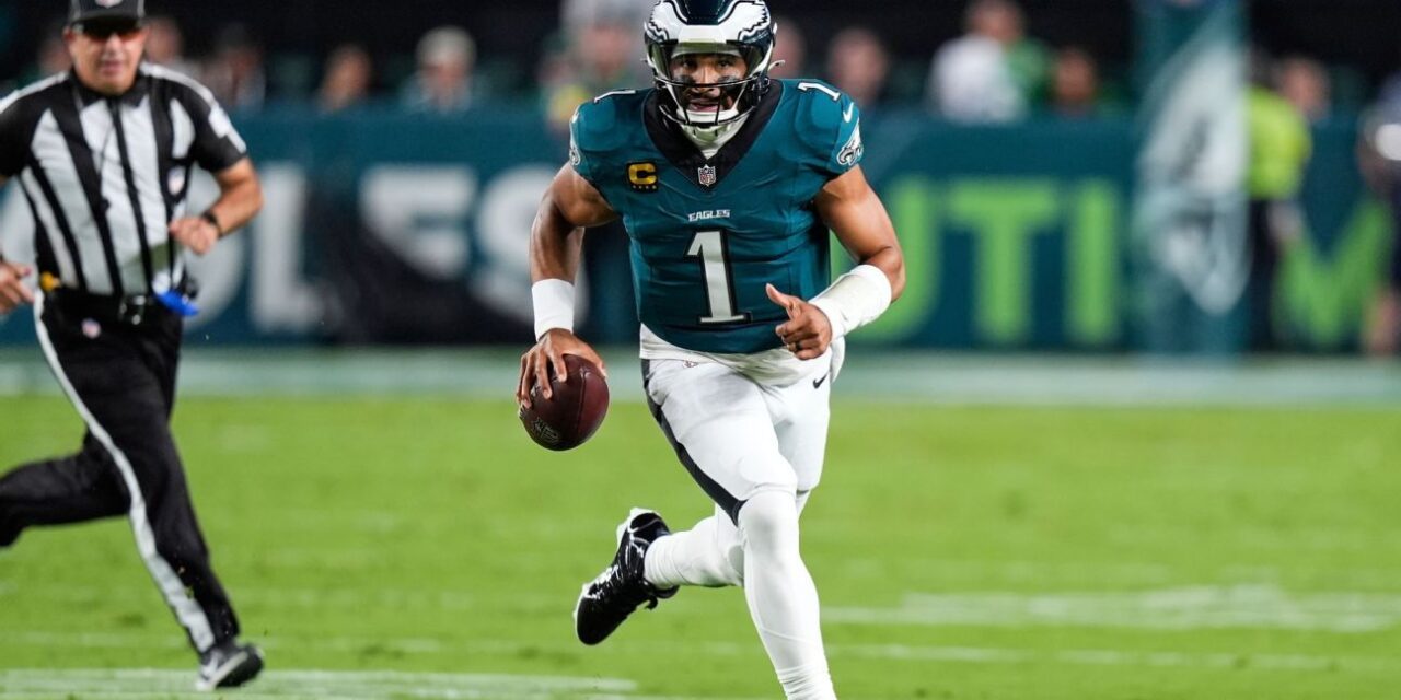 Banner day for Eagles as champs hold off Cowboys in wild one