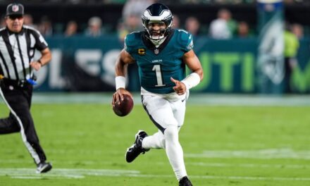 Banner day for Eagles as champs hold off Cowboys in wild one