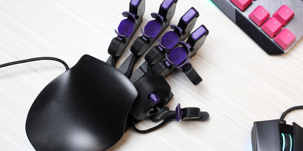 I got this crazy cyborg keypad to improve at PC games. I still suck