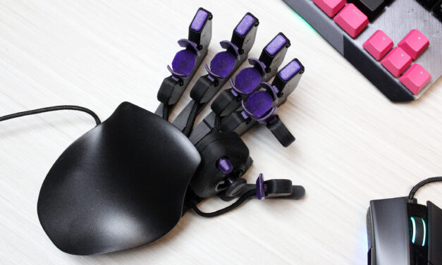 I got this crazy cyborg keypad to improve at PC games. I still suck