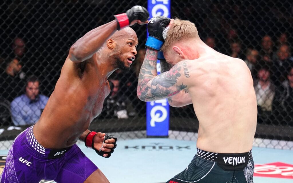 Michael ‘Venom’ Page reacts to Dana White walking out the arena during his UFC London win